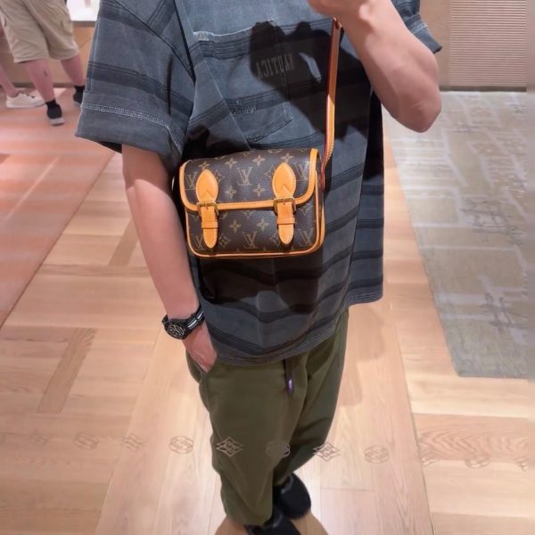Louis Vuitton brown with tan trim satchel