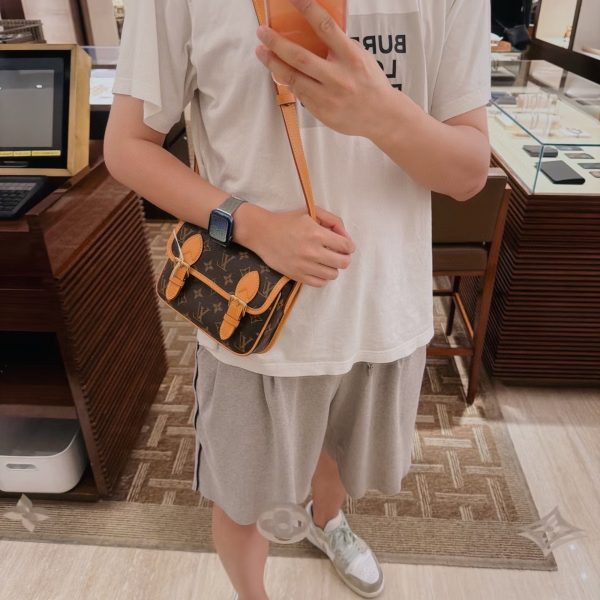 Louis Vuitton brown with tan trim satchel
