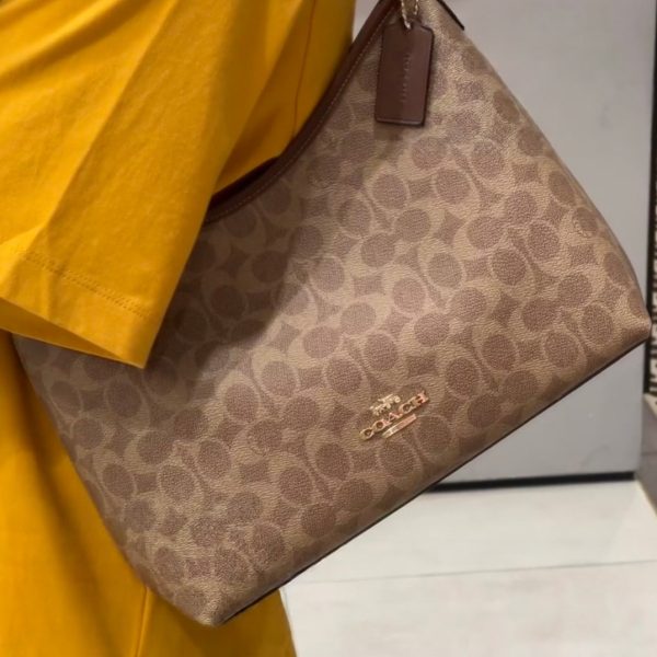 Coach brown with beige monogram shoulder bag