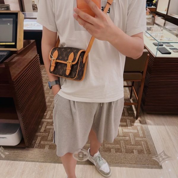 Louis Vuitton brown with tan trim satchel