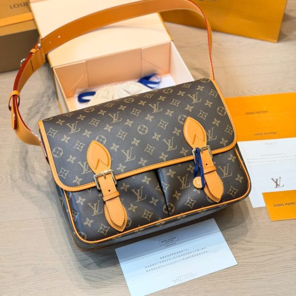 Louis Vuitton brown with tan trim satchel · LX-20260707221805671200121
