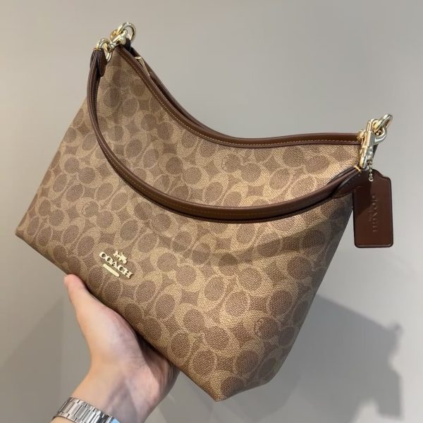 Coach brown with beige monogram shoulder bag