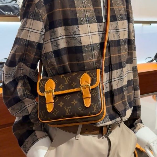 Louis Vuitton brown with tan trim satchel