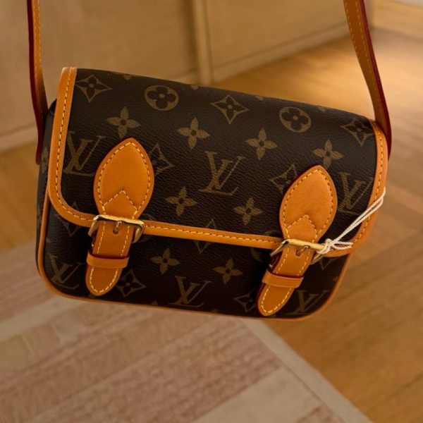 Louis Vuitton brown with tan trim satchel
