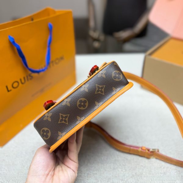 Louis Vuitton brown with orange trim satchel · 19.5 · LX-2026072221401