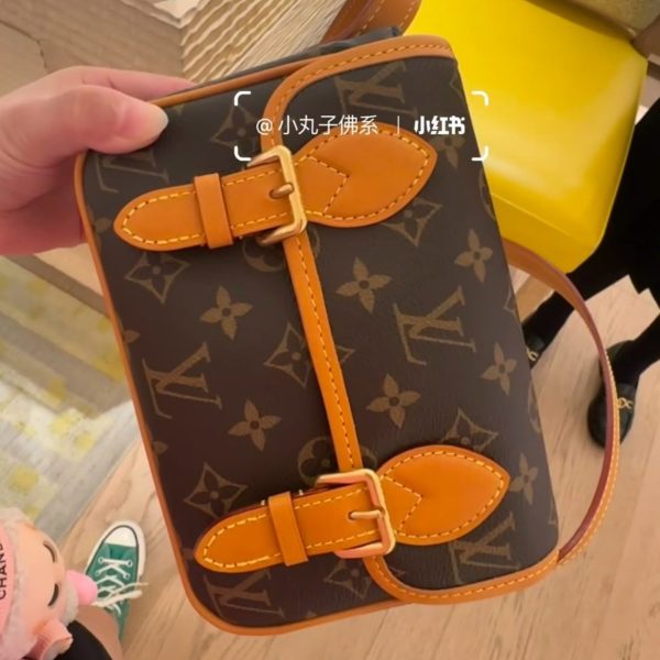 Louis Vuitton brown with tan trim satchel