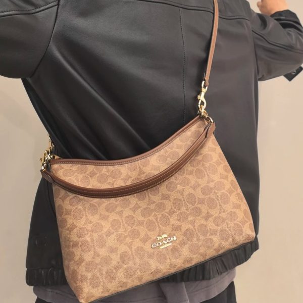 Coach brown with beige monogram shoulder bag