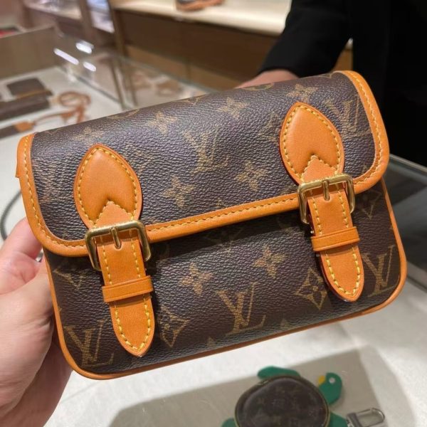 Louis Vuitton brown with tan trim satchel