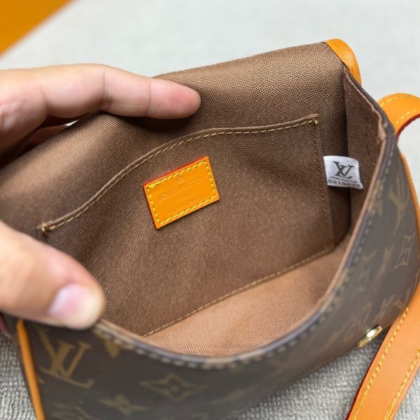 Louis Vuitton brown with orange trim satchel · 19.5 · LX-2026072221401